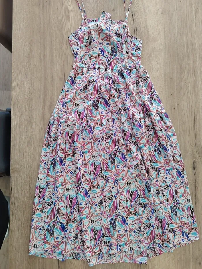 Jolie robe longue dos nu