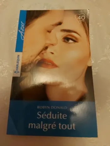 Livre Harlequin Séduite malgré tout