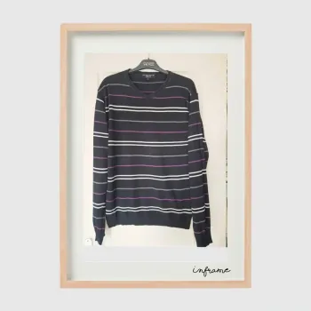 Pull rayé taille L