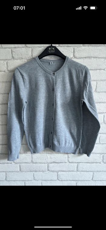 Gilet uniqlo taille 10 ans