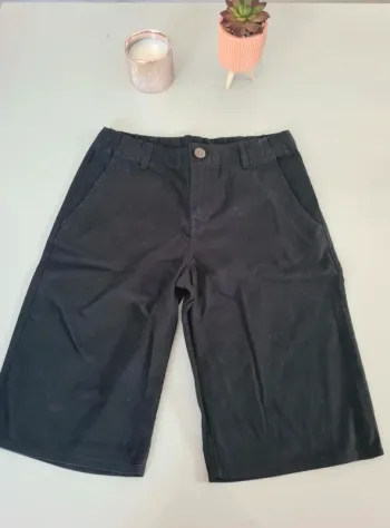 Short noir H&M taille 10/11 ans