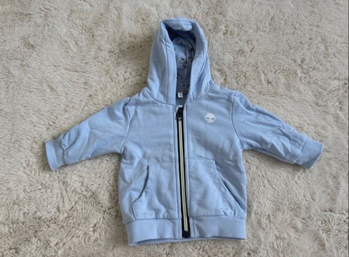 Pull à capuche à zip