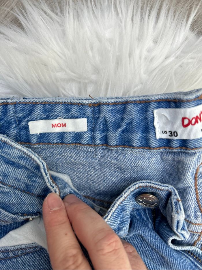 Mom déchiré - photo numéro 4