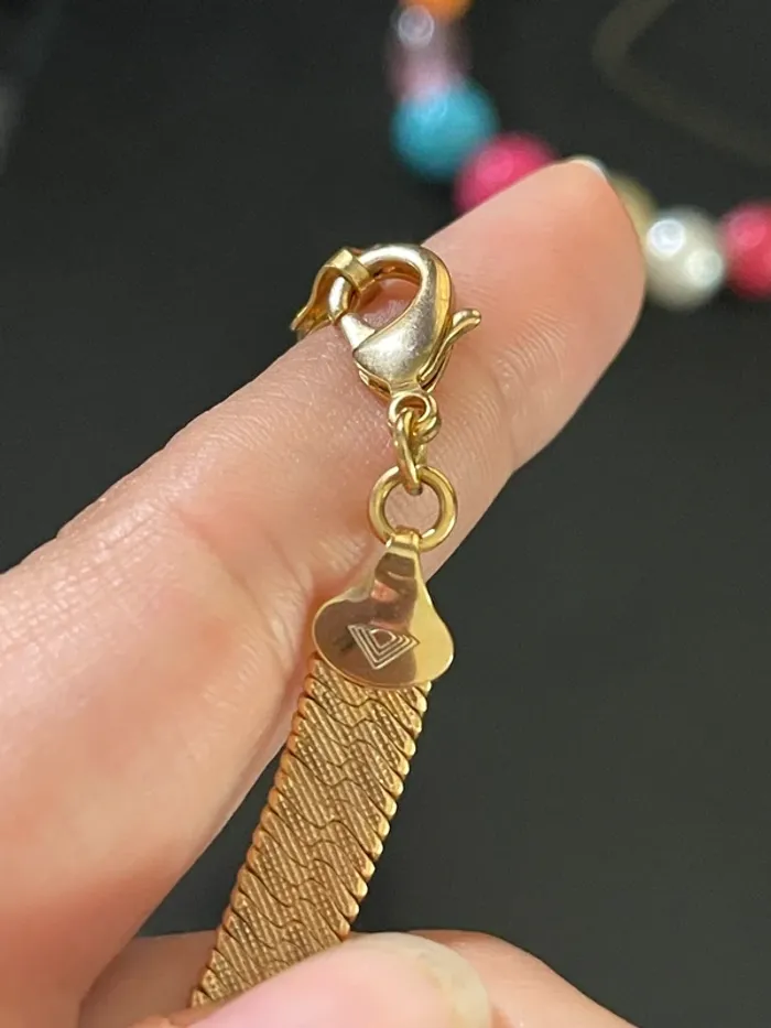 Ensemble collier et bracelet doré - photo numéro 2