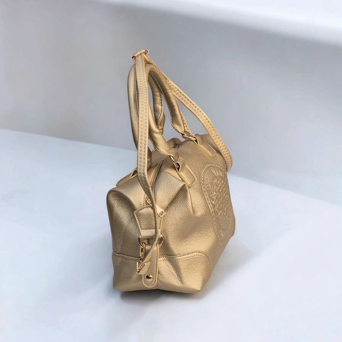 Sac à main doré chic - style bowling vintage