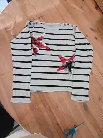 Pull leger sequins magiques