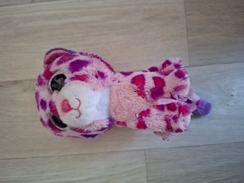 Peluche léopard rose yeux brillants – bon état