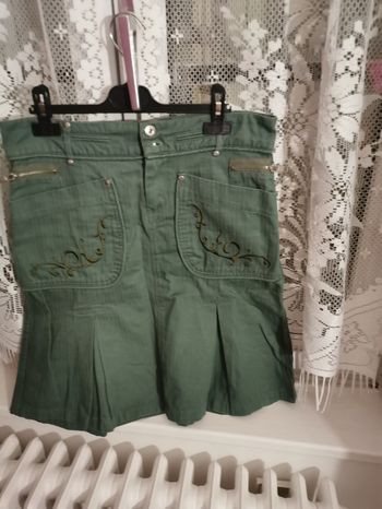 Jupe avec broderie, 6 poches boutons et fer