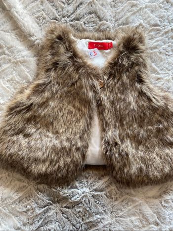 Veste fausse fourrure 12 mois