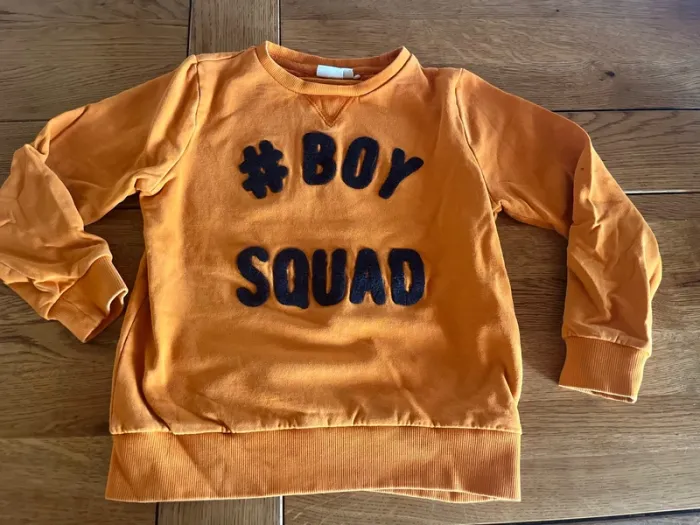Pull orange name it 7-8 ans