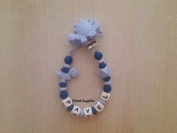 Attache tétine dinosaure