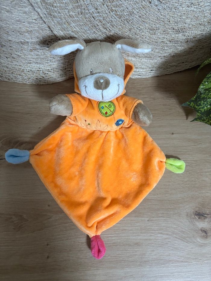 Doudou plat chien orange capuche oiseau nicotoy