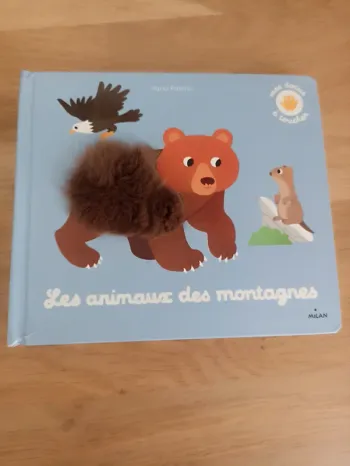Livre les animaux des montagnes à toucher.