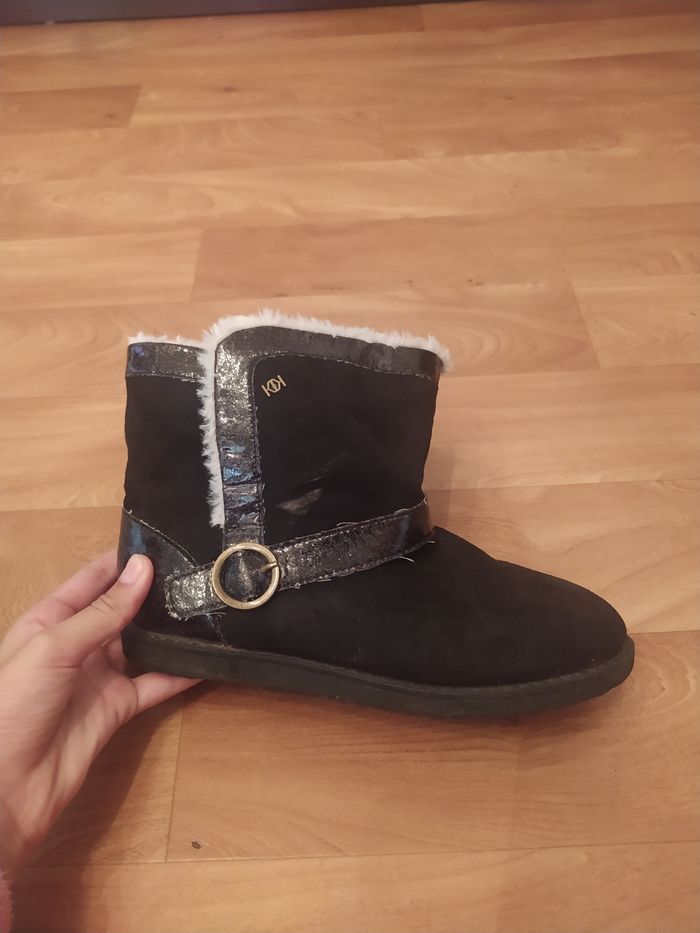 Bottines noires  fourrure blanche