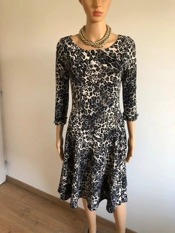 Robe patineuse imprimée léopard en velours taille unique excellent état