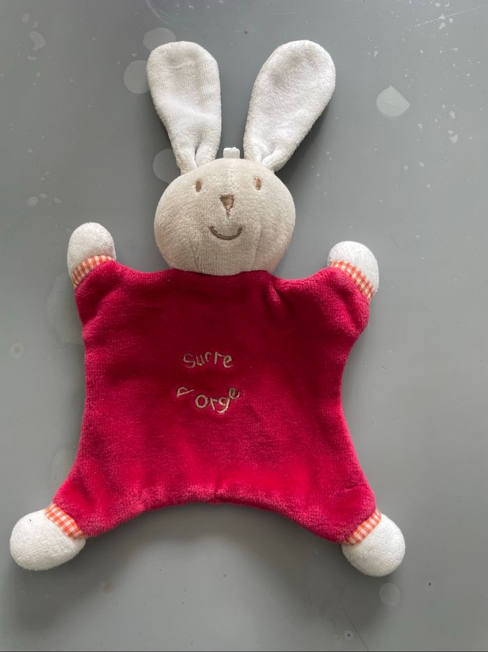 Petit doudou lapin Sucre d'Orge rouge et blanc très bon état