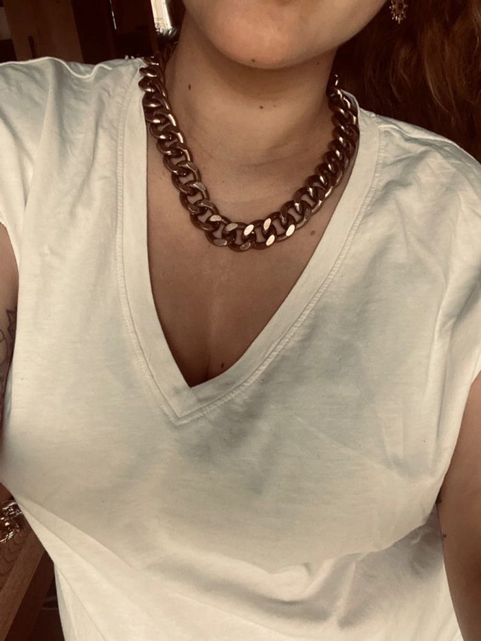 Collier avec anneaux roses gold entrelacés H&M très bon état