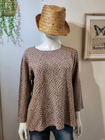 Pull col rond moucheté