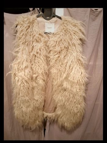 Veste sans manche fausse fourrure