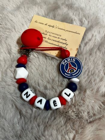 Attache tétine psg