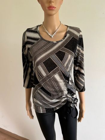 Haut pailleté avec manches 3/4 taille 1 comme neuf