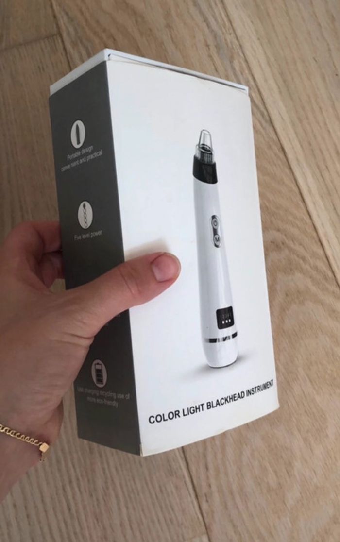 Appareil aspirateur points noir