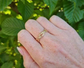 Bague torsadée à l'infini plaqué or taille 56 neuve