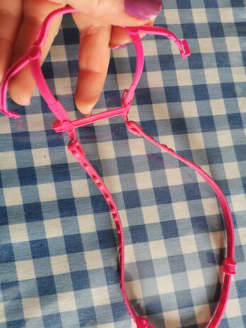 Jouet bride de cheval en caoutchouc rose fushia