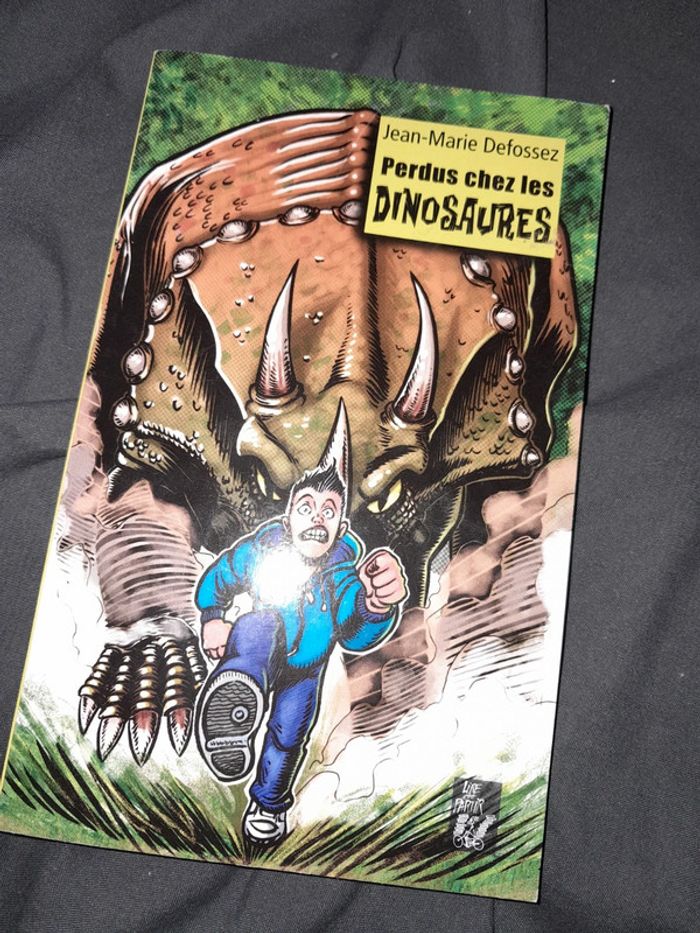 Livre perdu chez les dinosaures