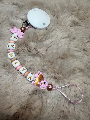 Attache tétine tortue