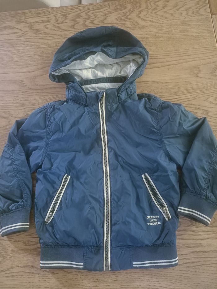 Veste imperméable à capuche