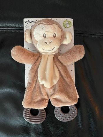 Peluche animal avec papier bruissant et anneau de dentition neuf