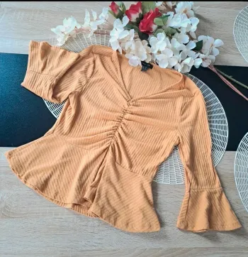 Top péplum, taille L, marque New Look