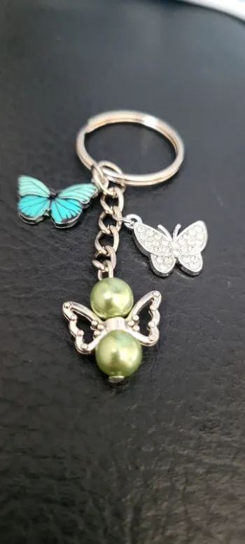 Porte-clés ange gardien et papillons
