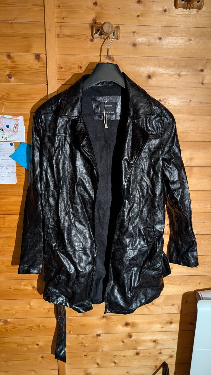 Trench noir reptile
