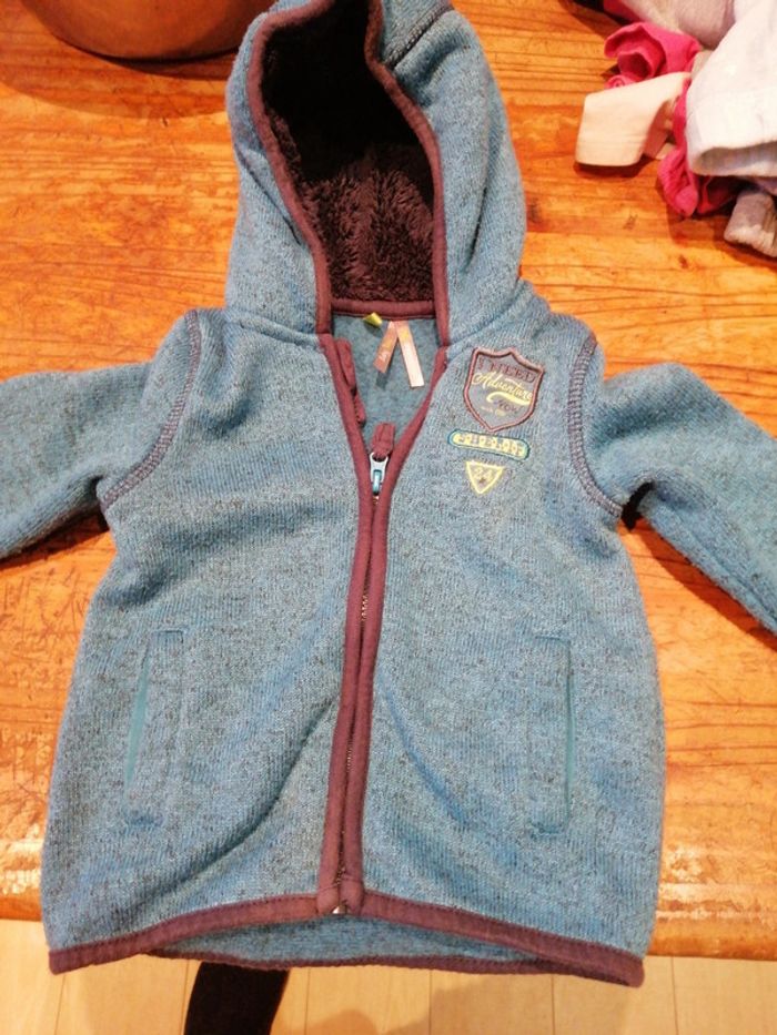 Gilet capuche moumoute