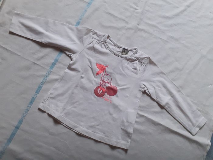 Sweet blanc motif orangé pailleté petite fille sur cerises