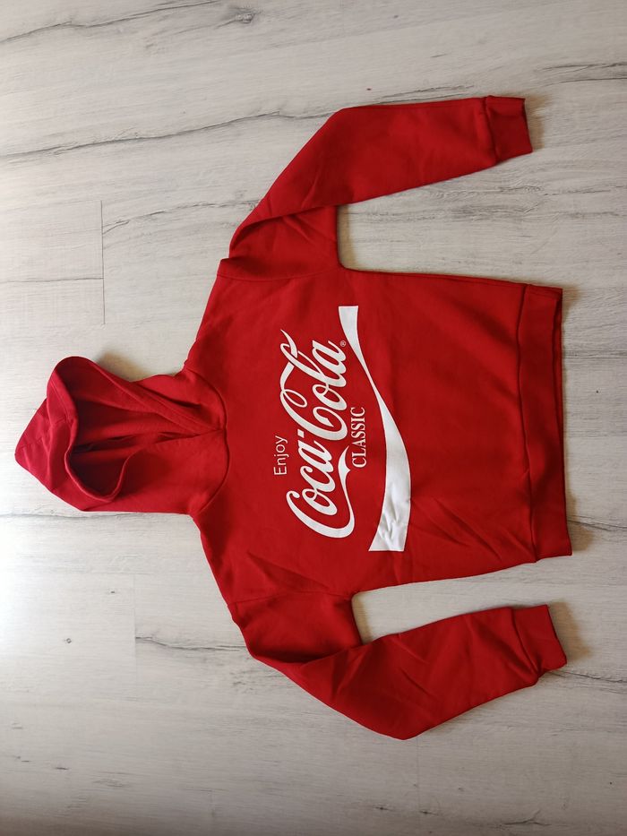Sweat à capuche marque coca cola taille XS