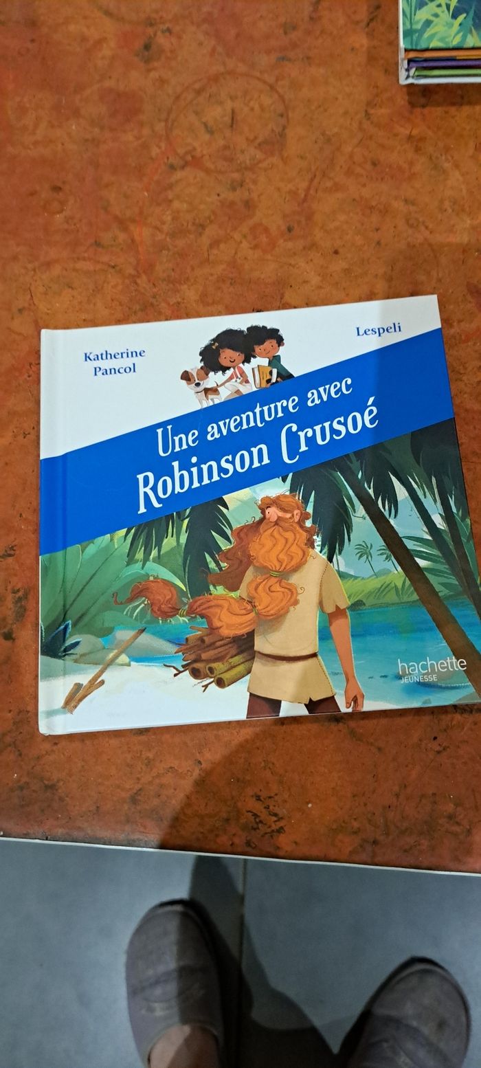 Livre une aventure avec Robinson crusoe