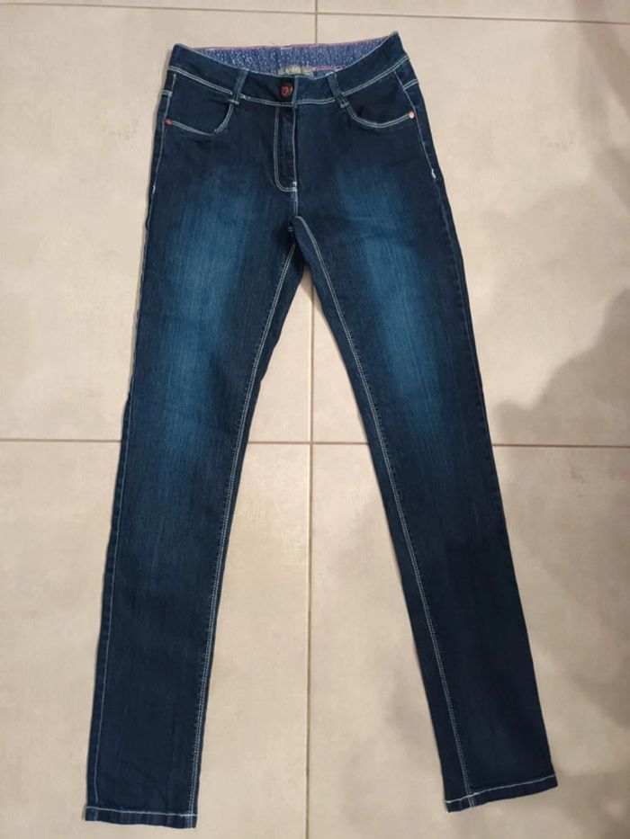 Jean fille neuf T 14 ans