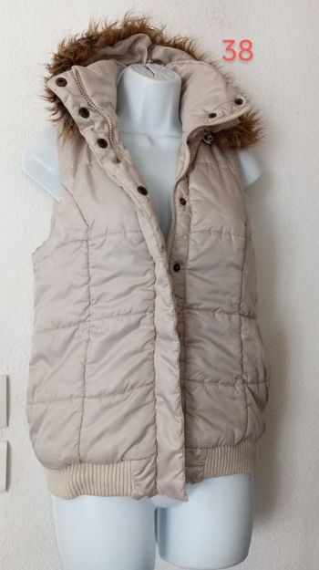 Doudoune capuche sans manche Femme.38