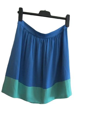 jupe courte et vague tissu fluide effet soie marque medwinds taille indiquée L = 40/42