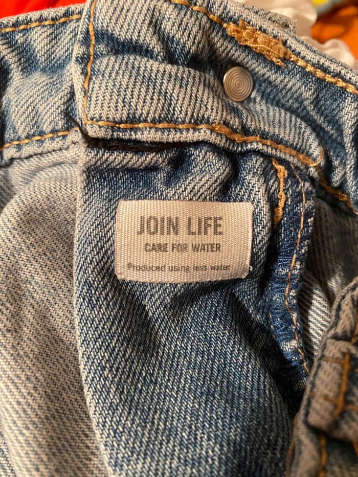 Jeans troué - photo numéro 12