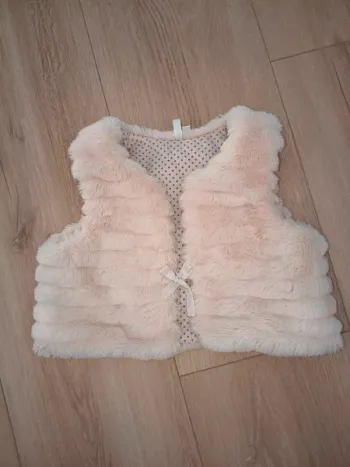 Veste fourrure sans manche taille 18 mois