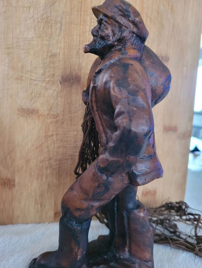 Sculpture pêcheur au filet - photo numéro 5