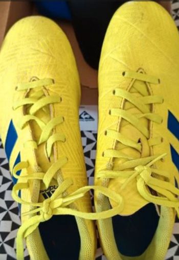 Lot chaussures, gants et chaussettes de foot