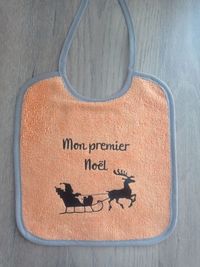 Bavoir orange mon premier Noël