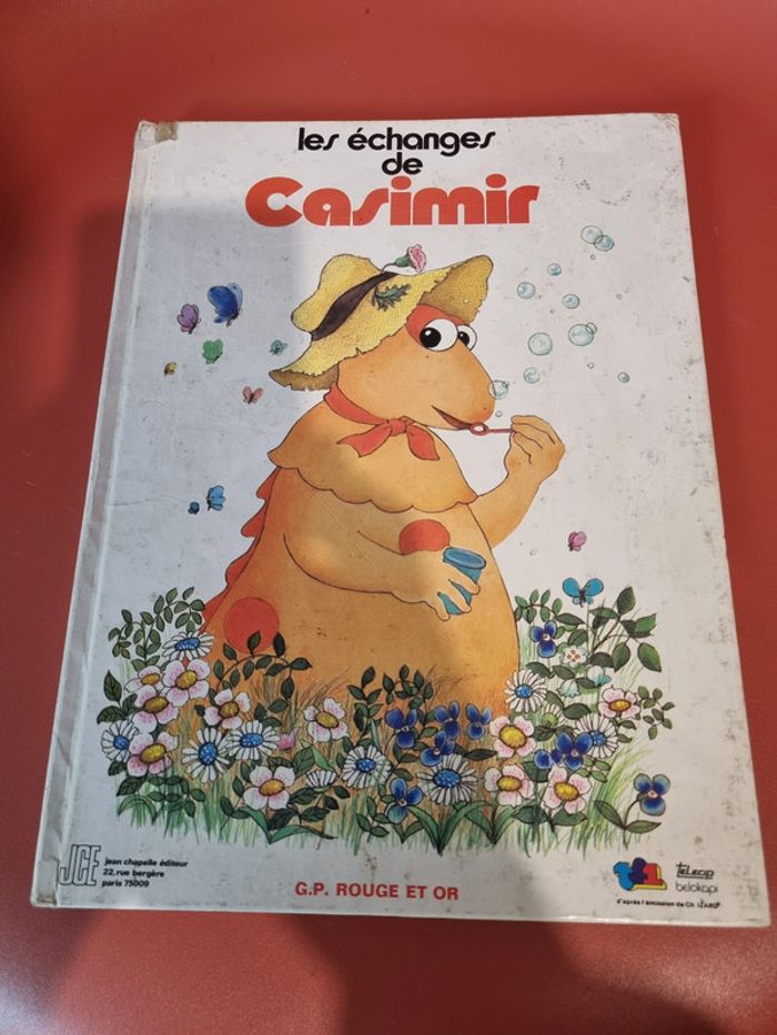 livre les échanges de casimir GP Rouge et or TF abimé