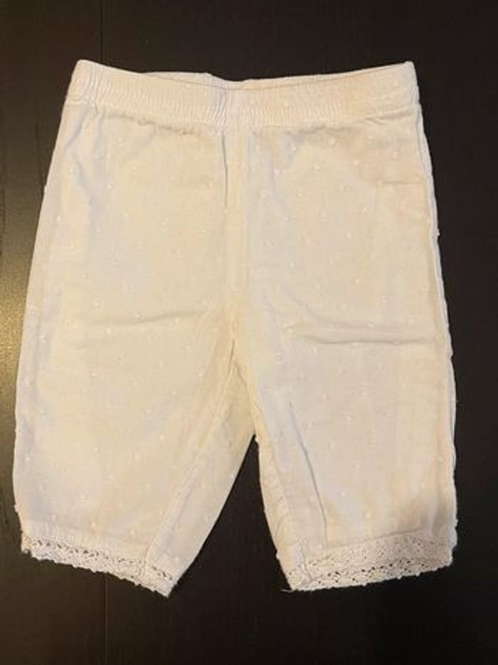 Pantalon blanc motif pois à relief