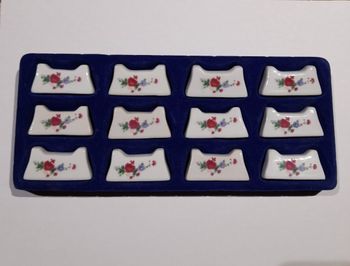 12 porte couteaux vintage en porcelaine 